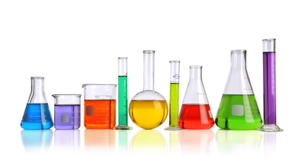 series of various chemistry beakers in different shapes and sizes, filled with different coloured liquids