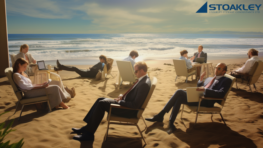 a group of approximately a dozen white collar professionals in stuffy business attire sit in beach chairs, literally on the beach, with laptops in their laps, cell phones and papers in hand, busy doing work when they should be relaxing at the beach, hearkening the overworked nature of North Americans and their stubborn refusal to take their allotted vacation time away from work, prizing being "always on" and over-dedicated to their jobs vs. enjoying their time off and what life has to offer